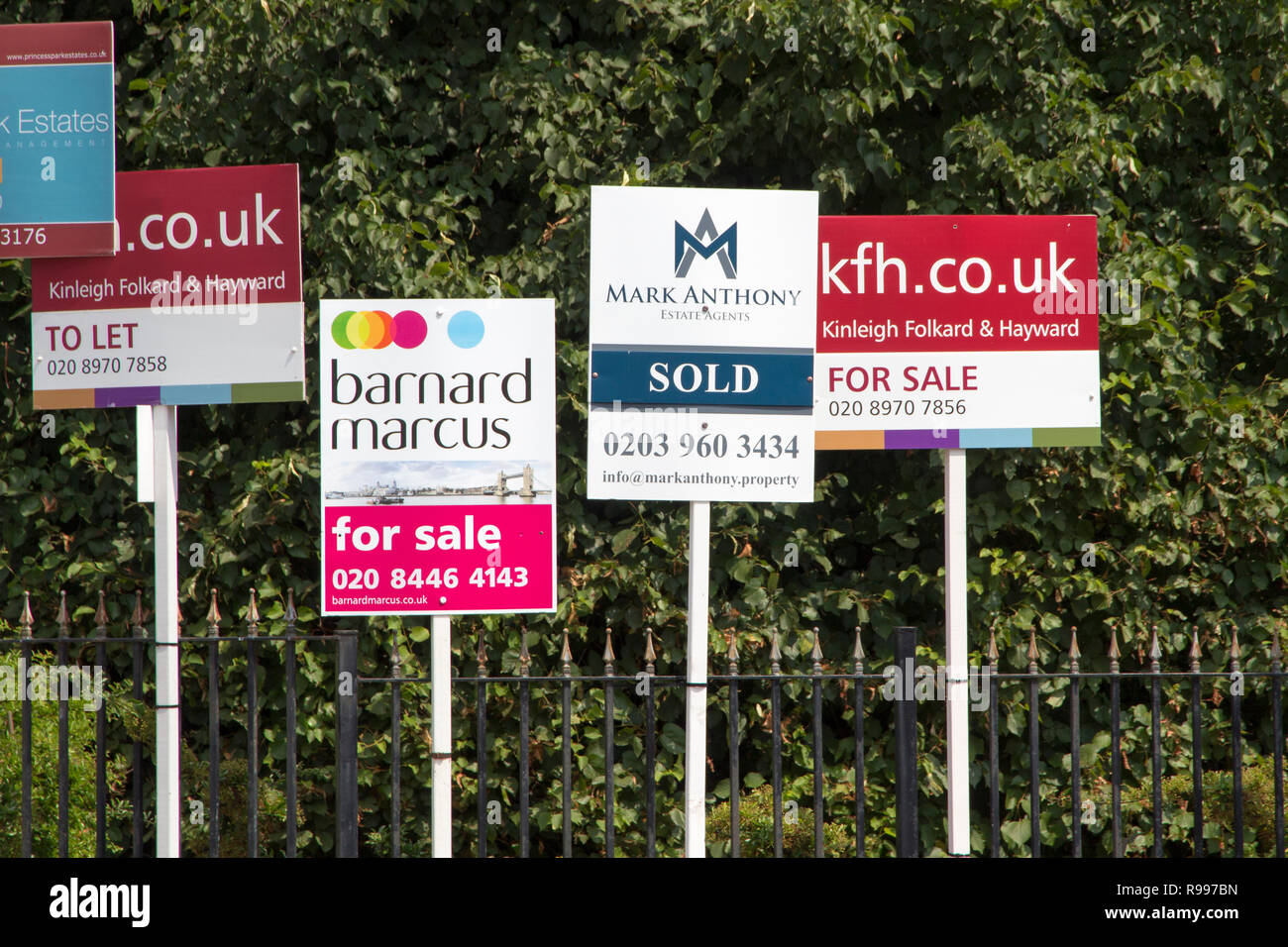 LONDON, ENGLAND July 21, 2018. For sale signs on display as prices