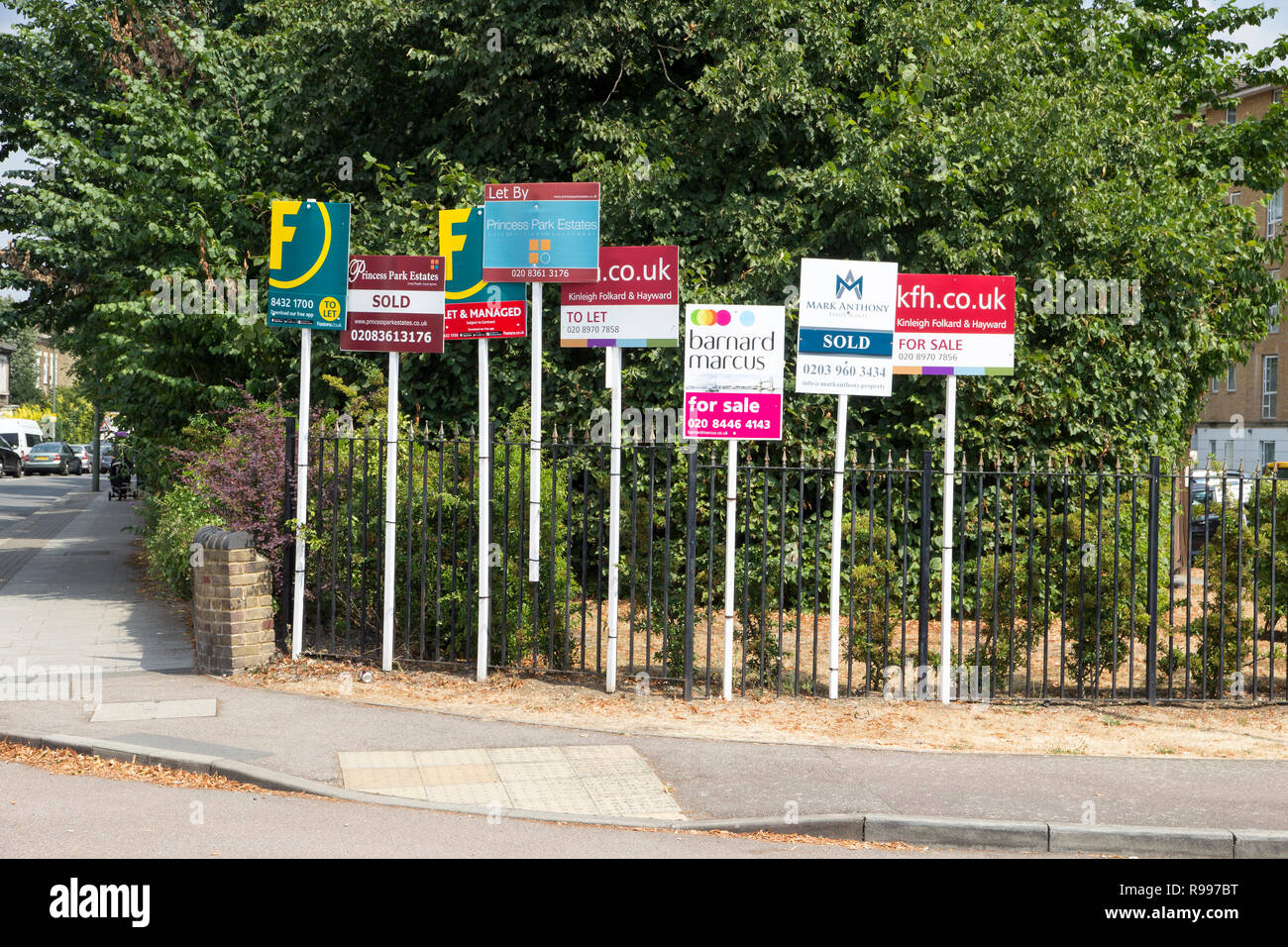 LONDON, ENGLAND July 21, 2018. For sale signs on display as prices