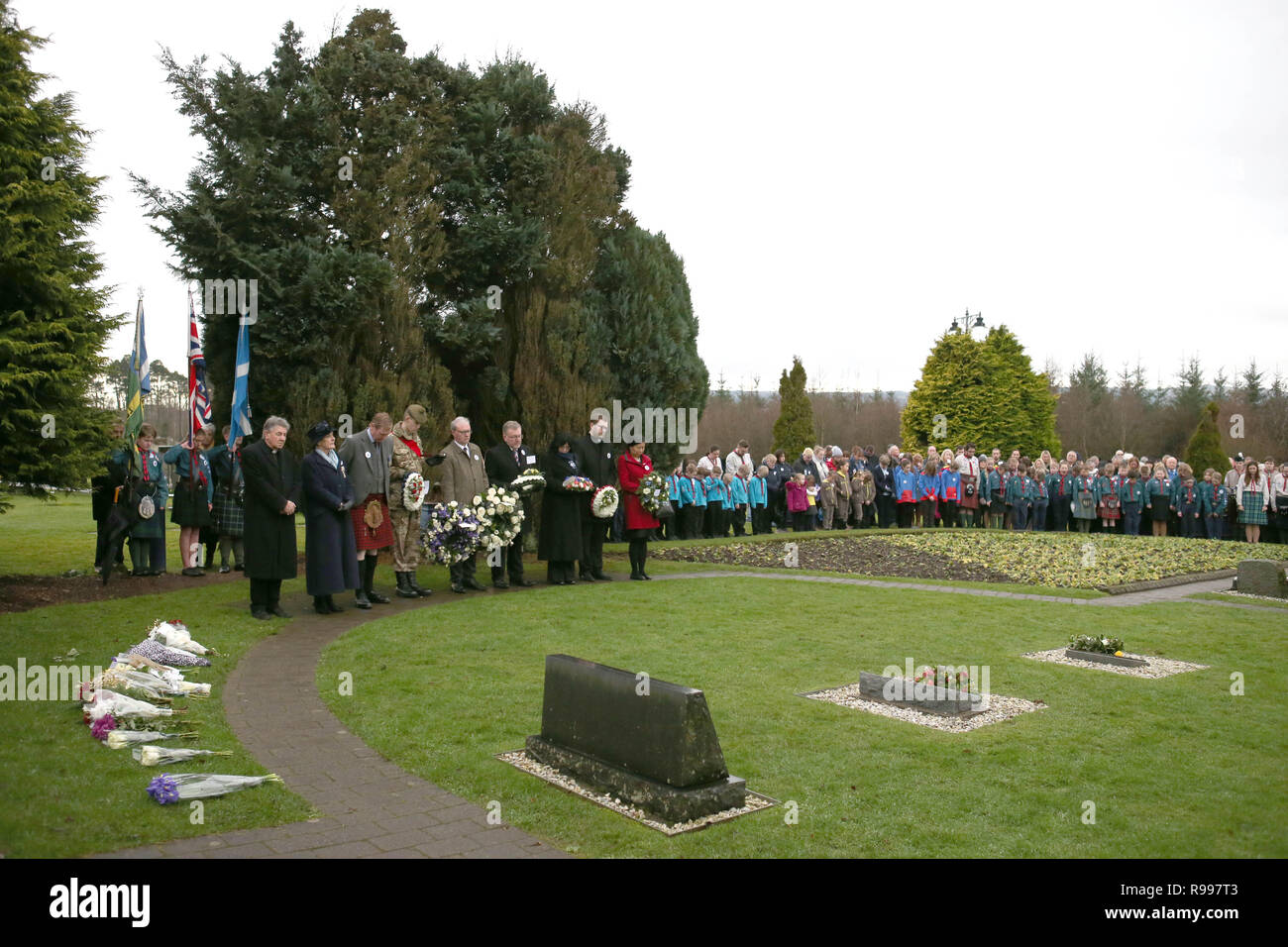 People gather for the service and wreath-laying to mark the 30th anniversary of the Lockerbie bombing at the Memorial Garden, Dryfesdale Cemetery, Lockerbie. Stock Photo