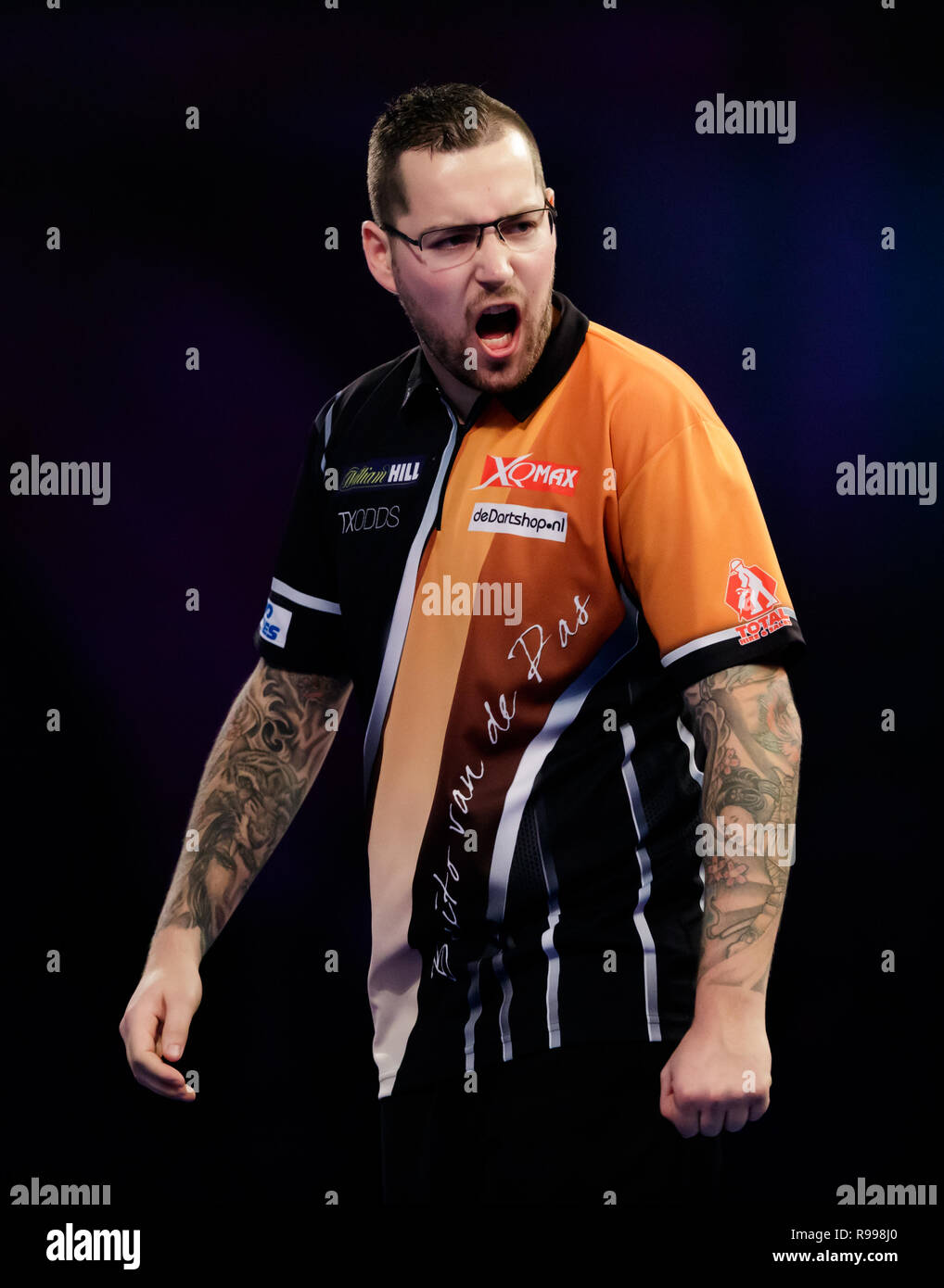 Benito van de Pas celebrates during his match against Jim Long during day  nine of the William Hill World Darts Championships at Alexandra Palace,  London Stock Photo - Alamy