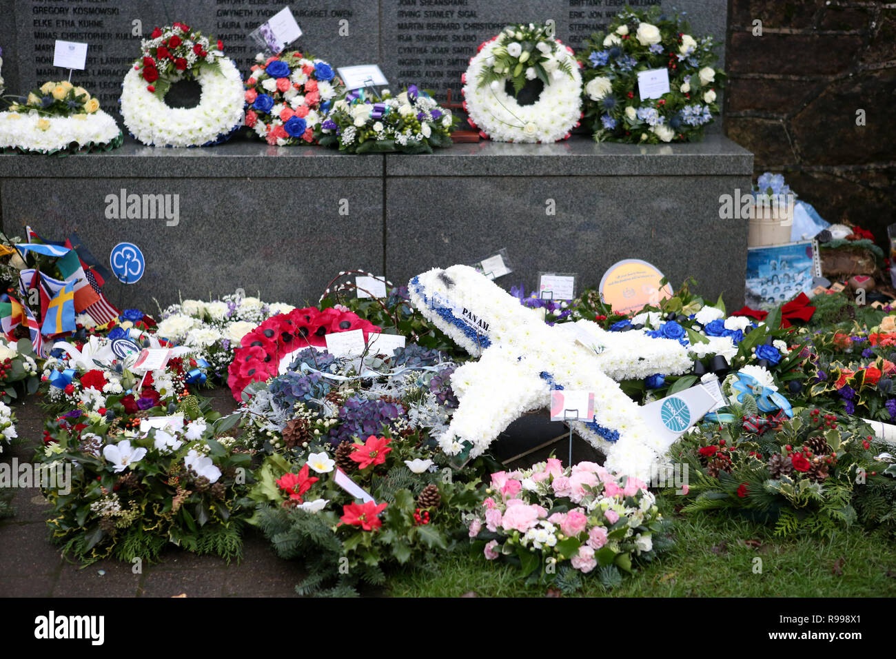 Floral tributes left during the commemoration service in the Memorial Garden at Dryfesdale Cemetery in Lockerbie to mark the 30th anniversary of the Lockerbie bombing. Stock Photo