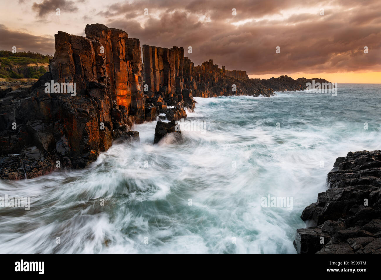 Bombo Quarry glowing in the first light of the day. Stock Photo