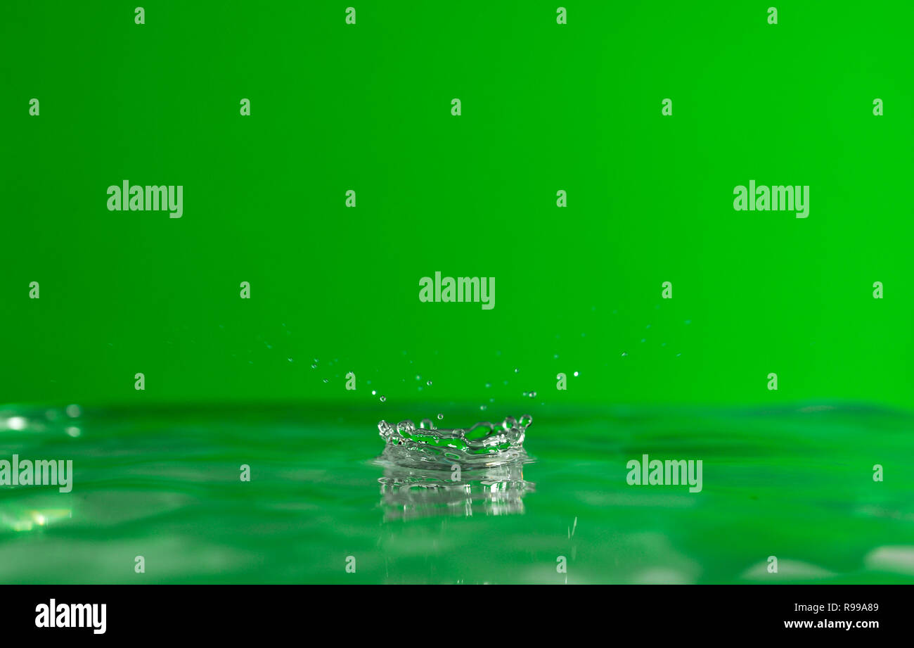 Droplet Hitting Water Surface Stock Photo Alamy