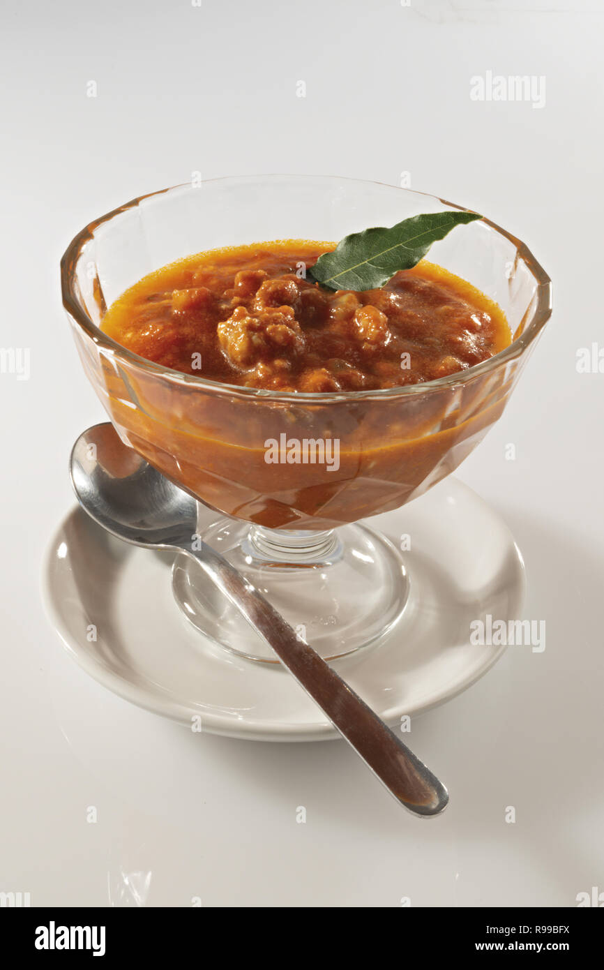 meat and tomato ragu in glass bowl Stock Photo