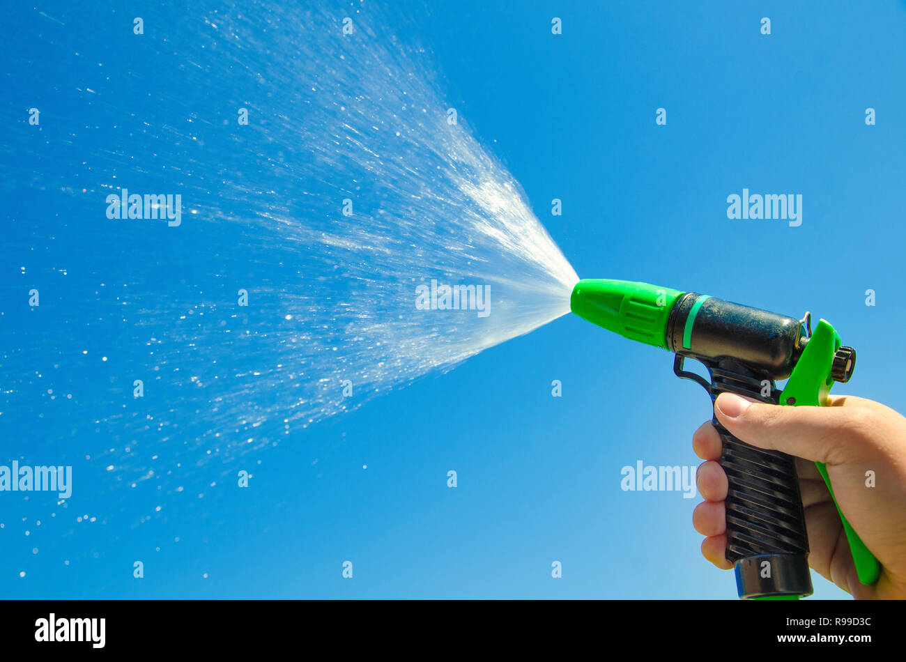 hand with water spray jet Stock Photo Alamy
