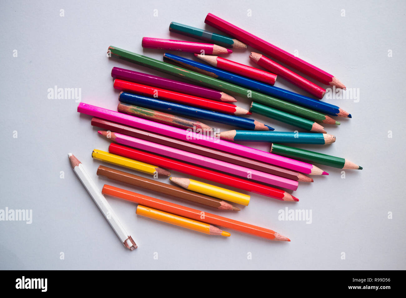 the colored pencils used on a white background. Stock Photo