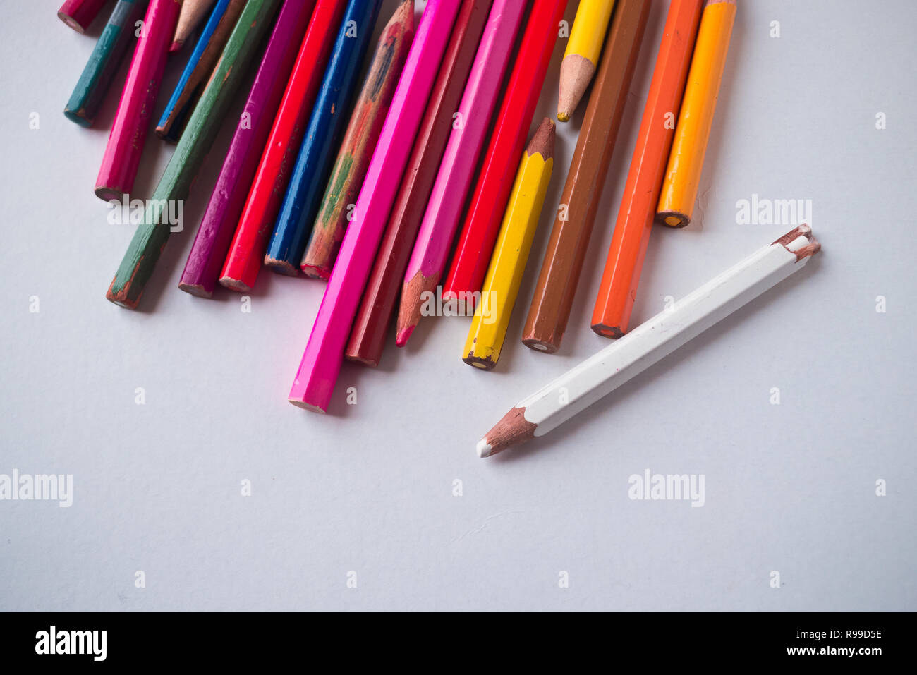 the colored pencils used on a white background. Stock Photo