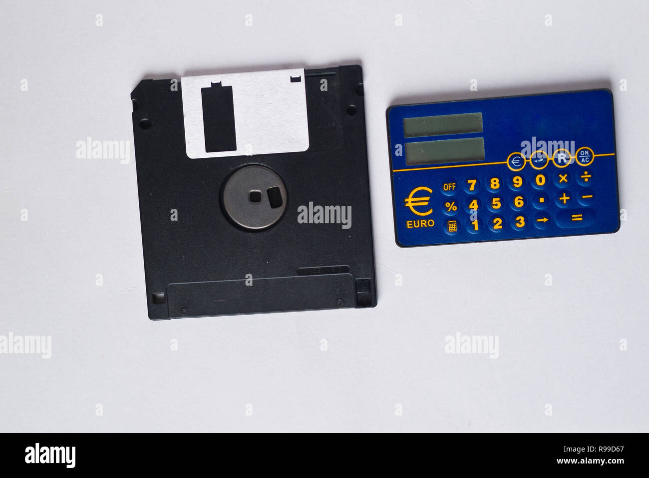 Floppy disc and converter tool. Stock Photo