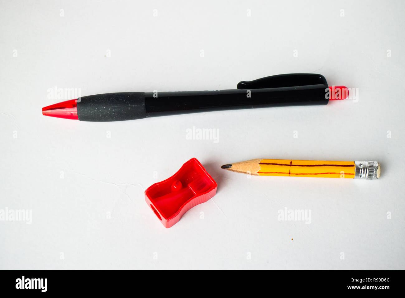 Pen,pencil and pencil sharpener . Stock Photo