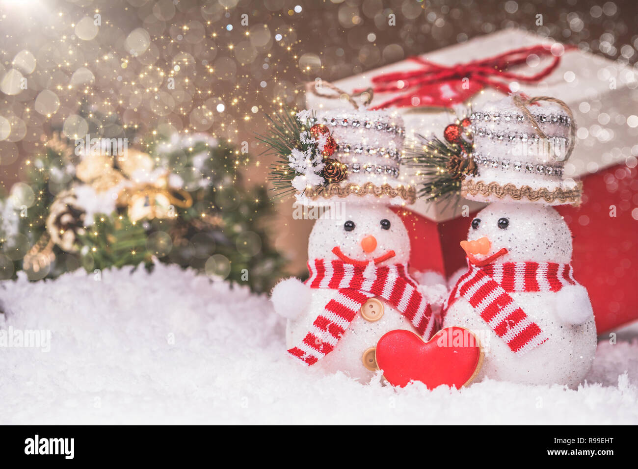 Snowman Couple With Red Heart Christmas Decorations And Snow Merry Christmas And Happy New Year Stock Photo Alamy