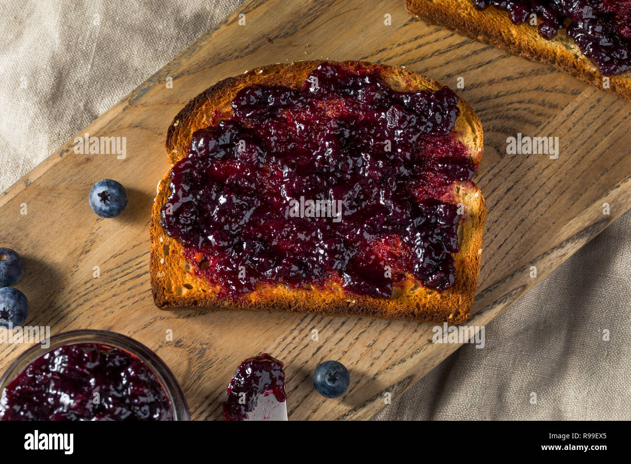 Organic Homemade Blueberry Huckleberry Preserves on Toast Stock Photo