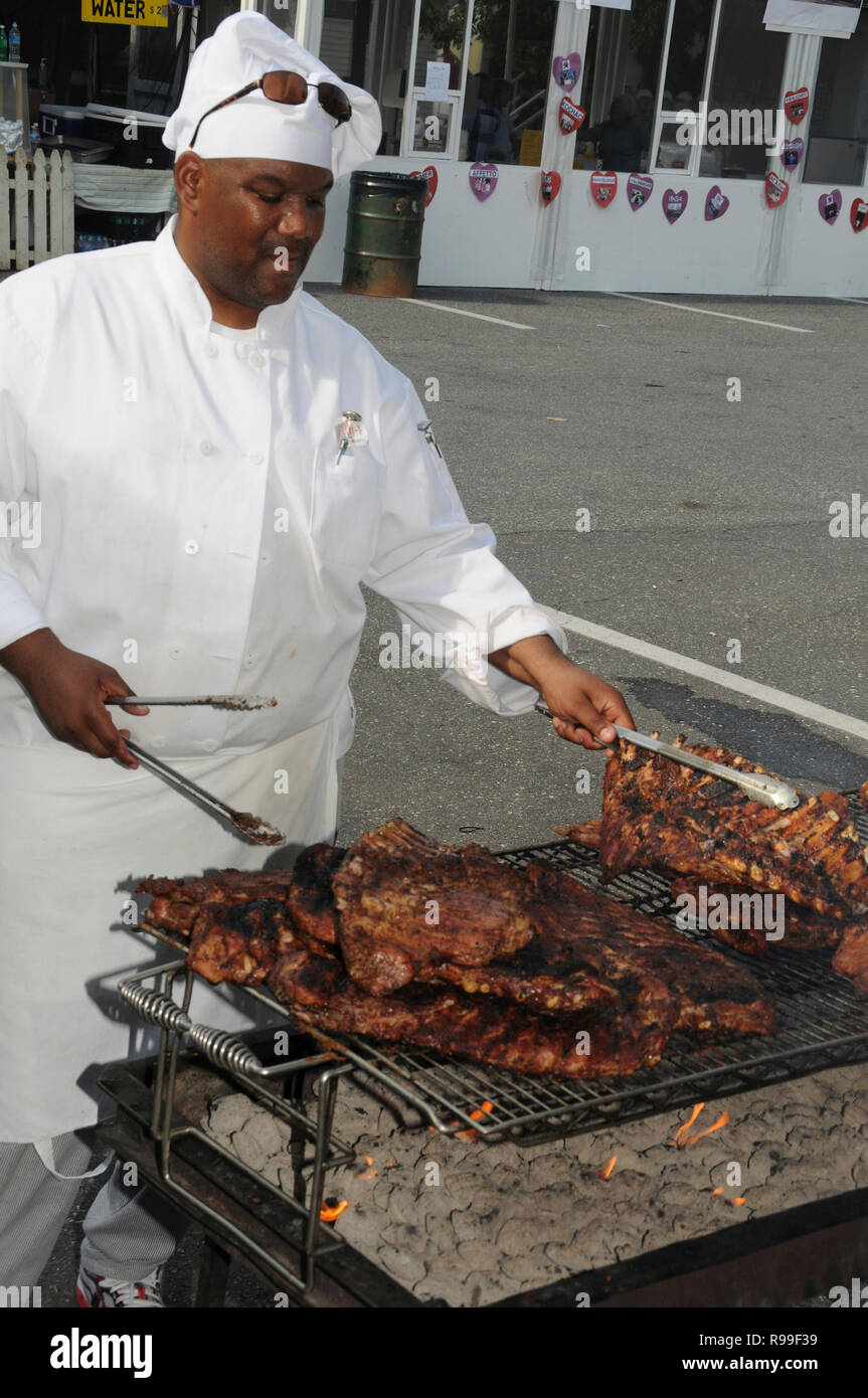 chef cooking ribs at the Labor Day festival in Greenbelt, Maryland Stock Photo