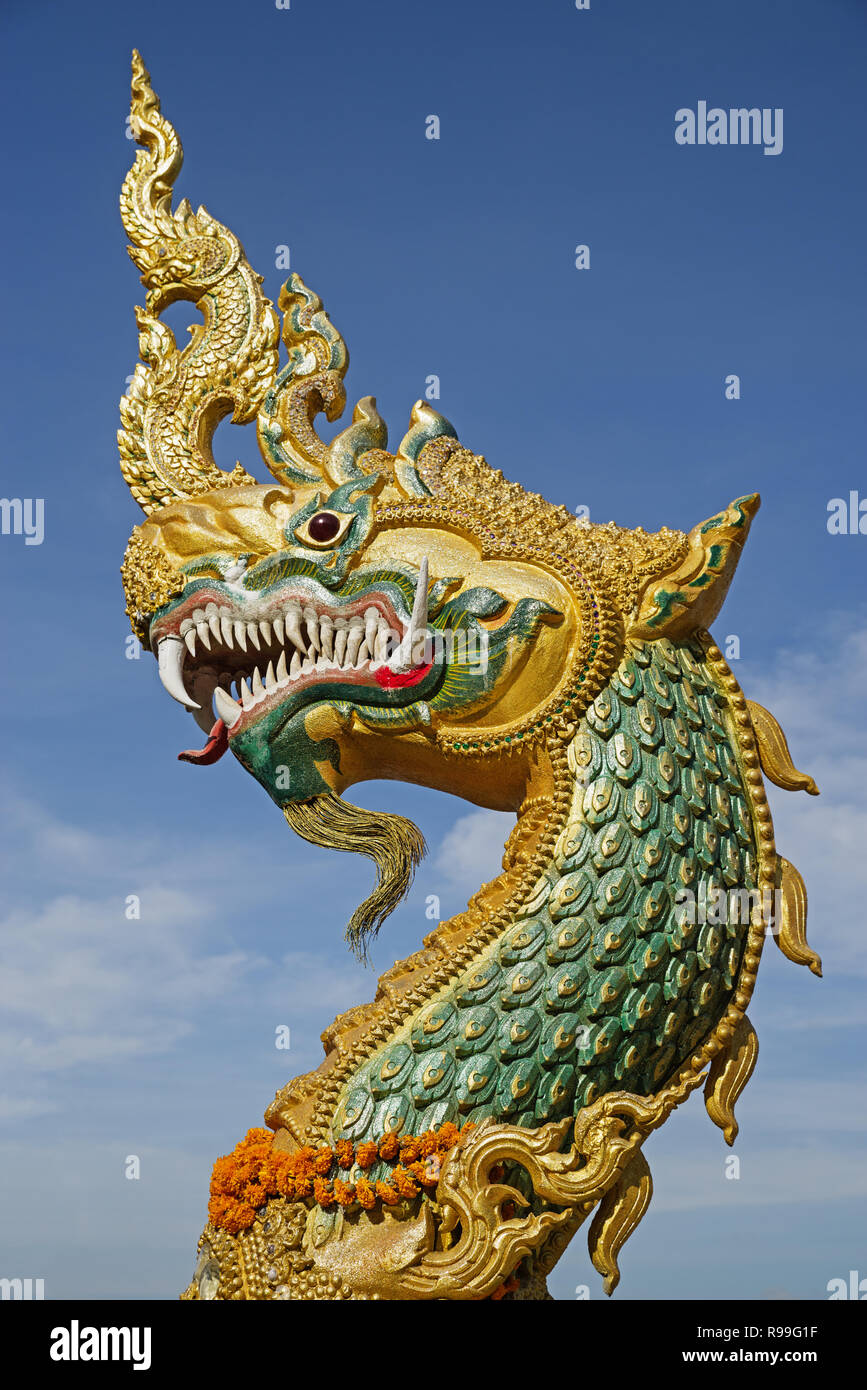 naga head statue at a temple on the banks of the Mekong River in Thakhek Laos Stock Photo