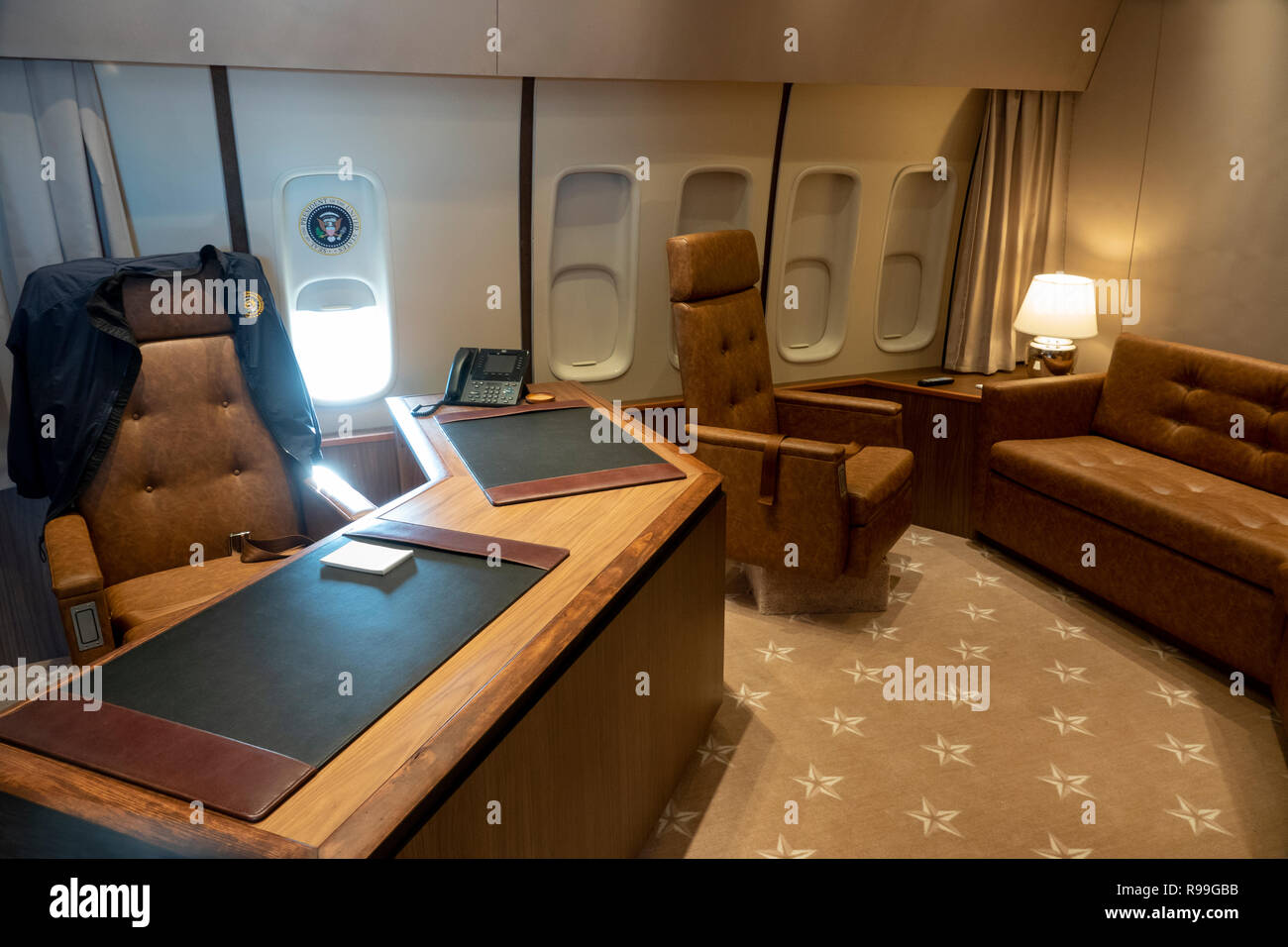 Air Force One replica mock up of the interior of the United States presidential aircraft Boeing 747 office meeting desk Stock Photo