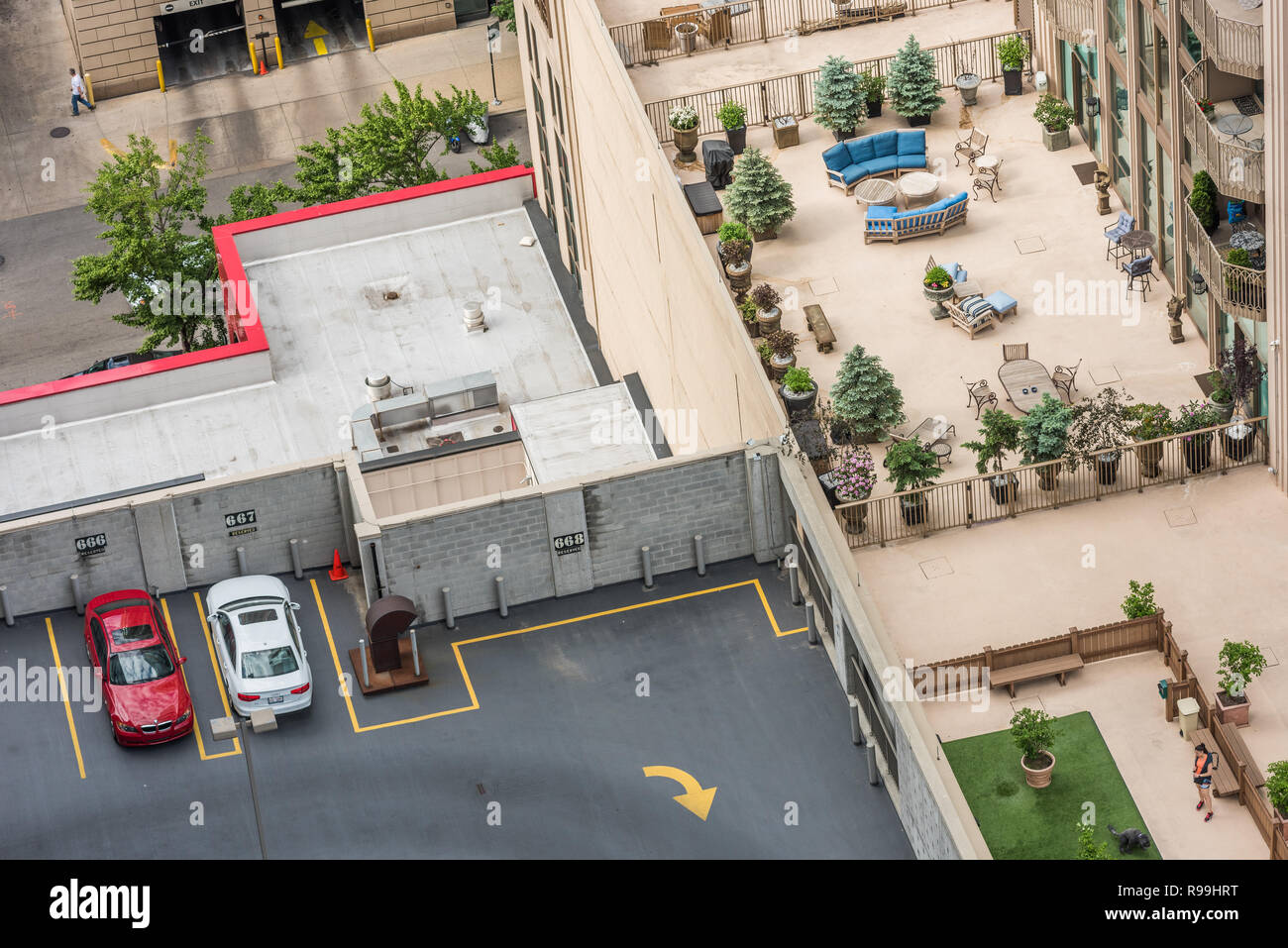 Aerial view of parking structure near highrise condo building Stock ...