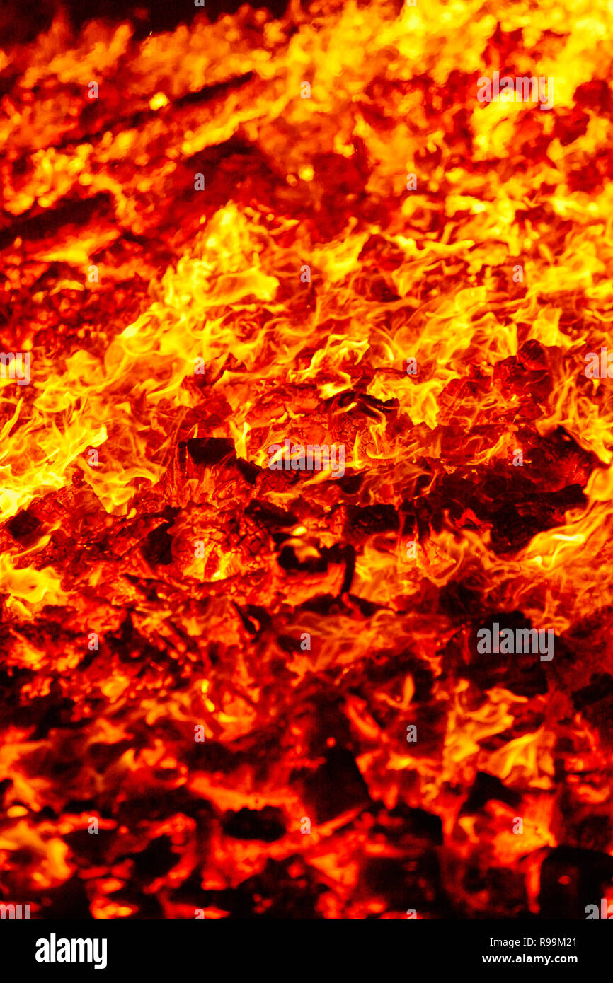 Fire. Volcano incandescent material. Hot charcoal bonfire. Carbon