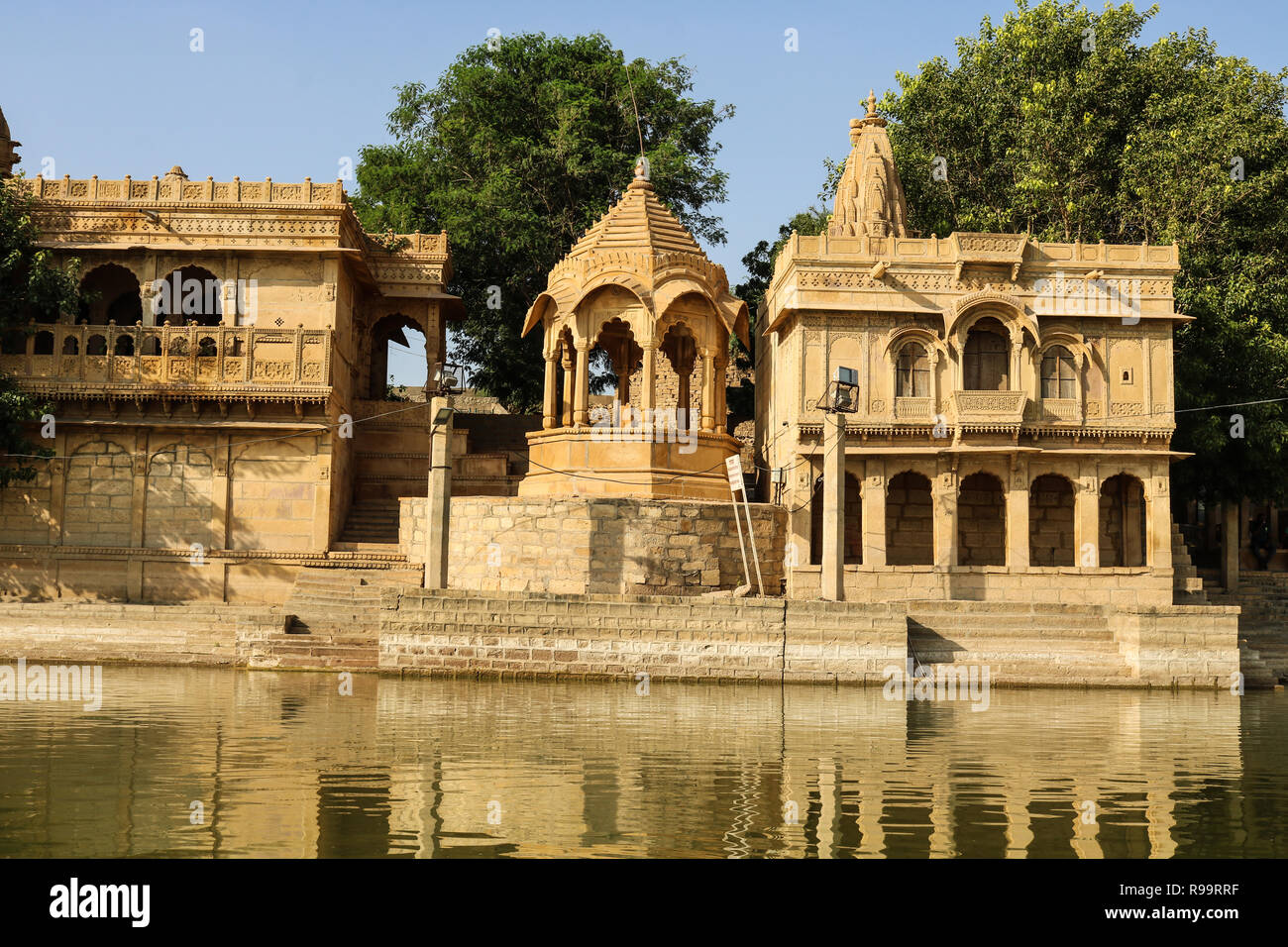 A Temple near man-made water reservoir (Gadisar Lake) in Jaisalmer, Constructed by the first ruler of Jaisalmer, Raja Rawal Jaisal. Stock Photo