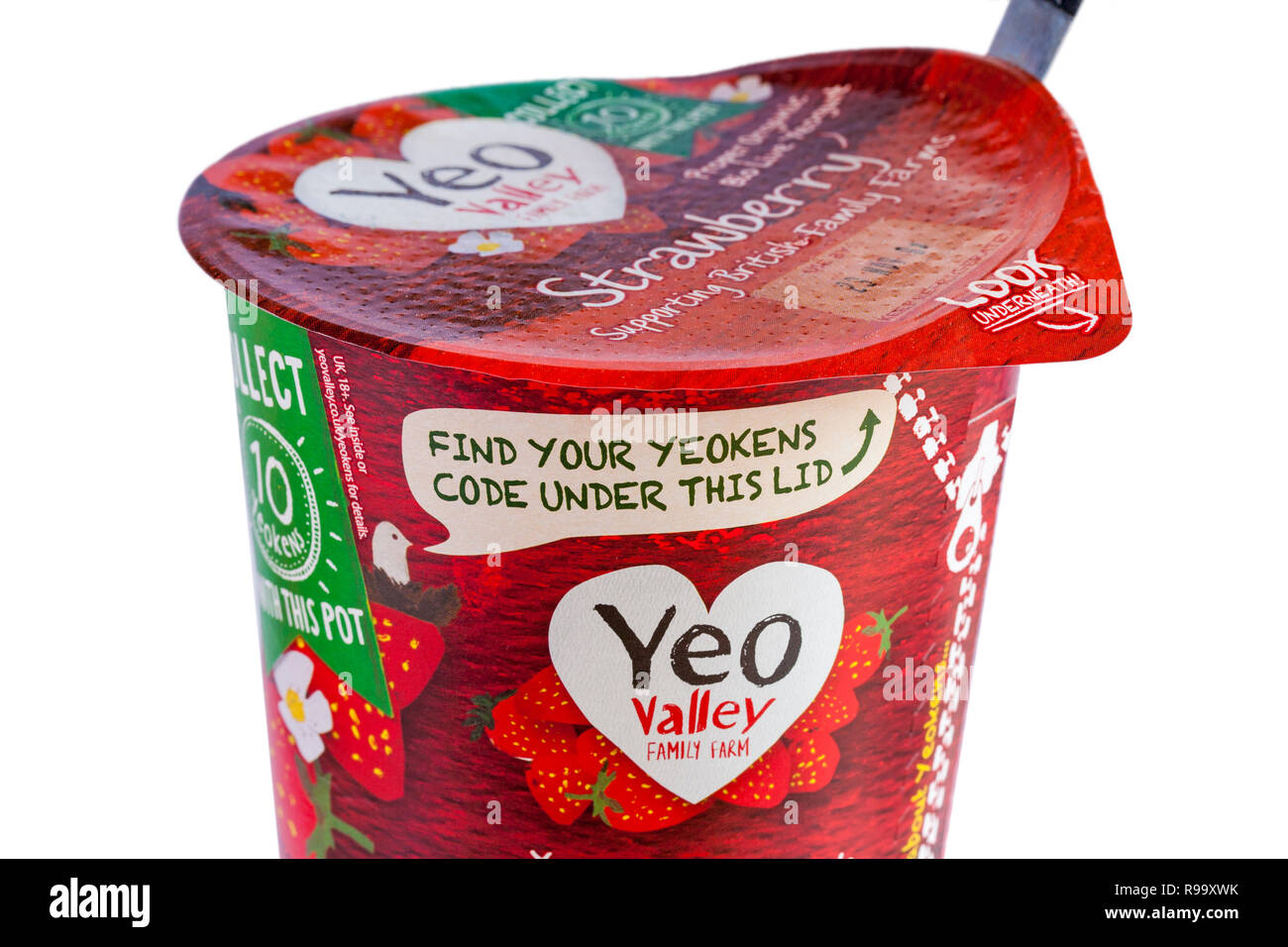 Find your Yeokens code under this lid - detail on Yeo Valley yogurt pot Stock Photo
