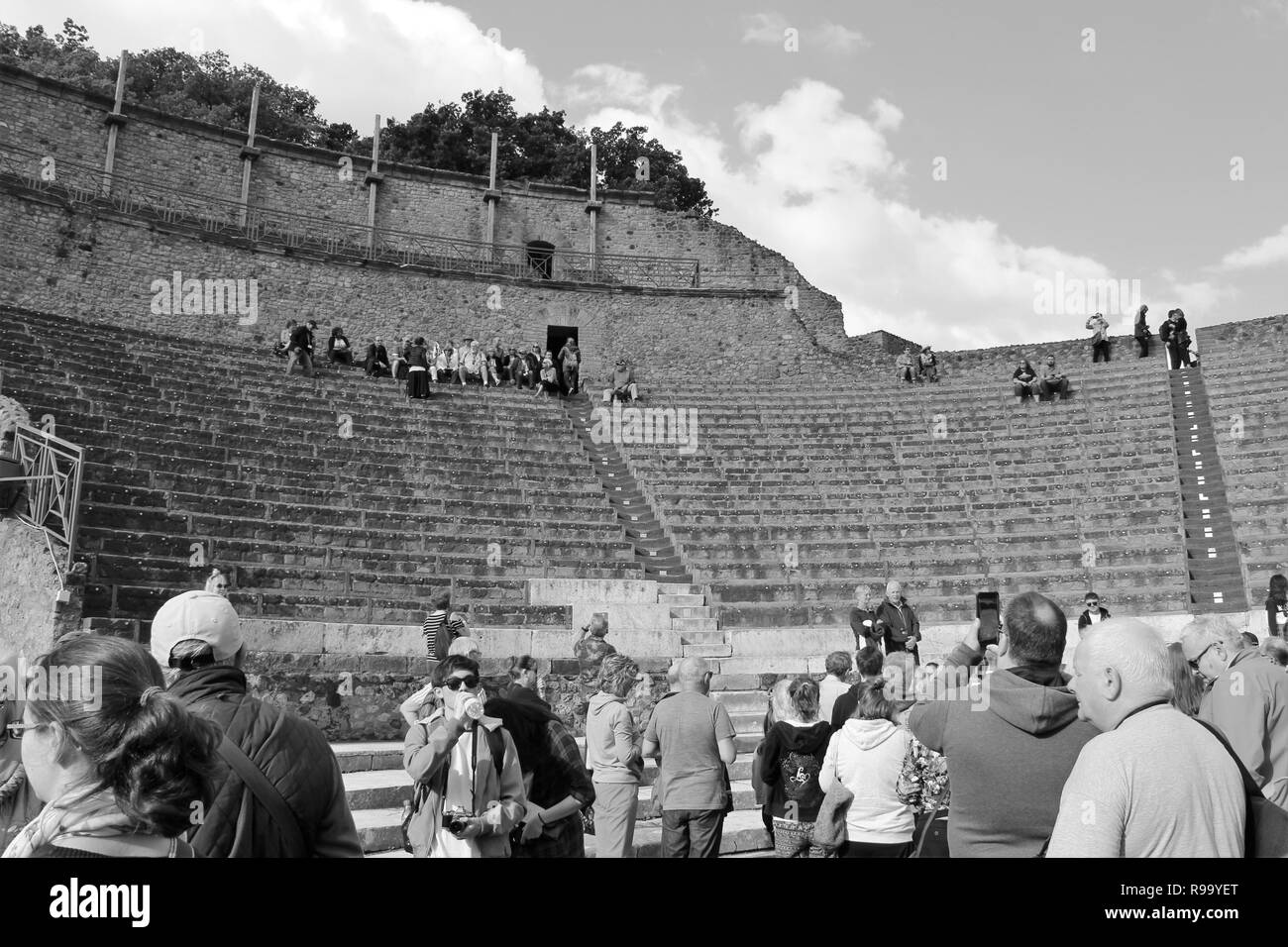 Pompeii, Italy - October 23rd 2018: Tourists explore the ruins of the amphitheater in the ancient city of Pompeii. Stock Photo