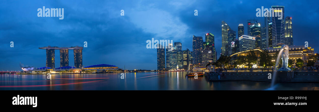 Three horizontal images in one photo, Bayfront panorama from the Merlion statue until the Marina Bay Sands hotel and the ArtScience Museum, Singapore Stock Photo
