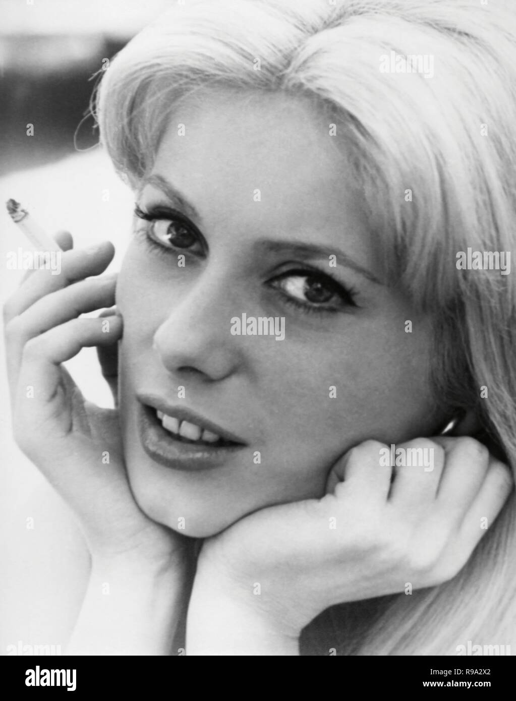 Catherine deneuve smoking hi-res stock photography and images - Alamy