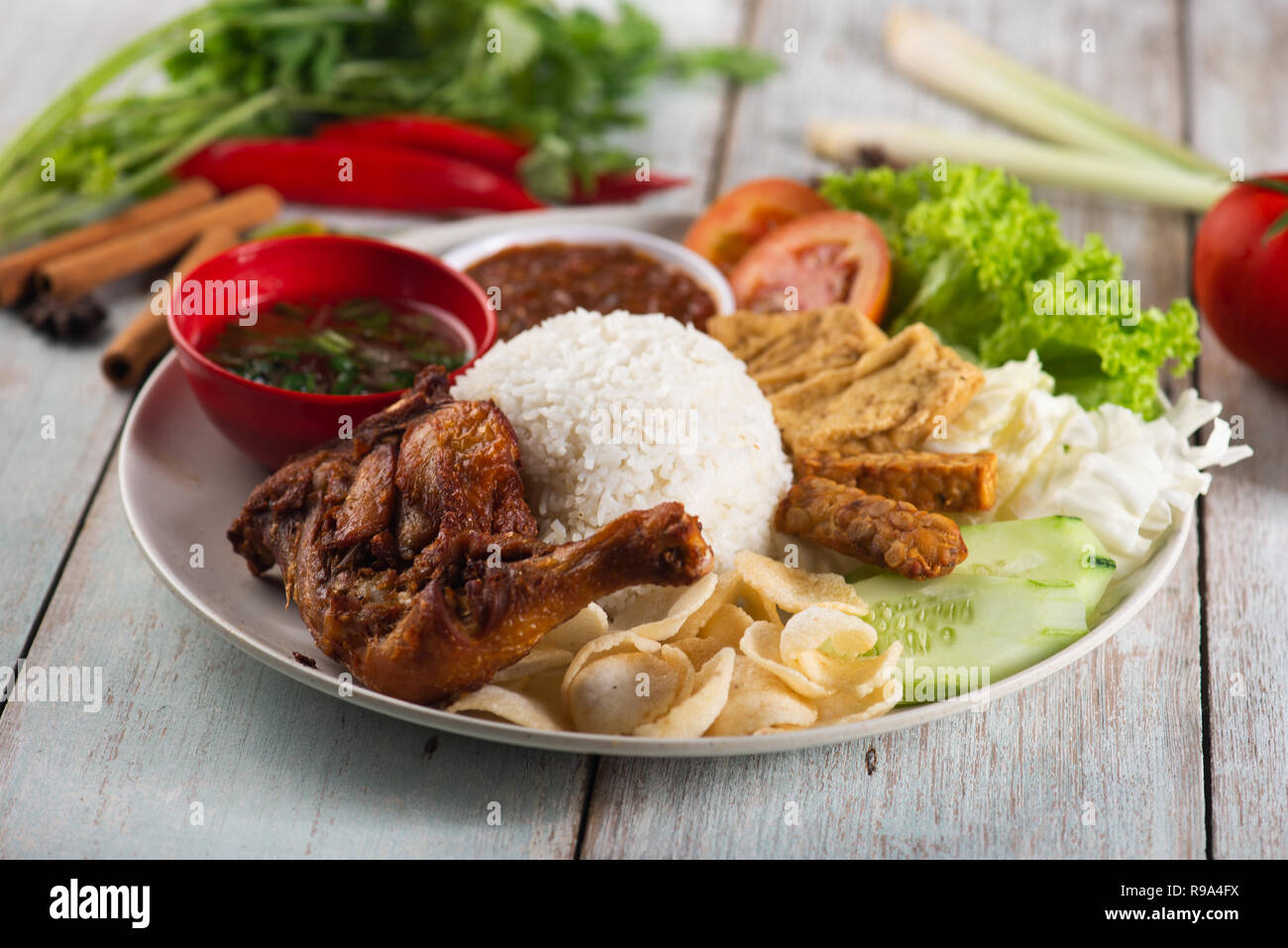 Nasi Campur Ayam Betutu. Stock Photo