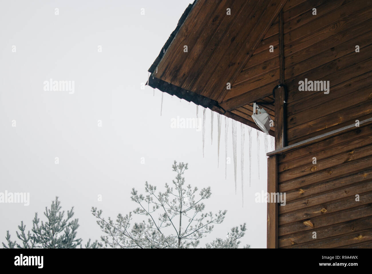 Frozen Icicles On The Wooden Roof Top Floor Wooden Mansion Icy