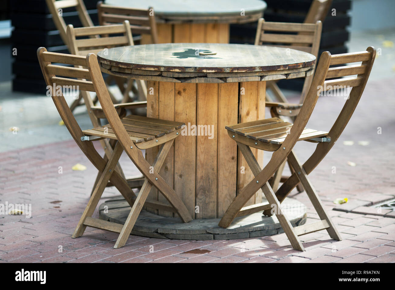 wooden chairs close-up in a street cafe Stock Photo