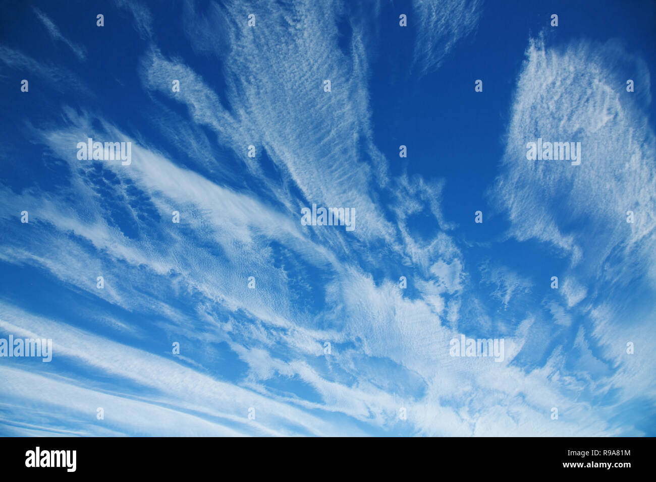 high cirrus clouds against the blue sky Stock Photo