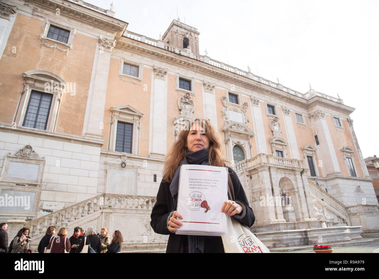 Roma, Italy. 19th Dec, 2018. The six promoters of 'Tutti per Roma, Roma per Tutti' are in Piazza del Campidoglio to meet Mayor of Rome Virginia Raggi to exhibit photos and documents on the degradation of the city Credit: Matteo Nardone/Pacific Press/Alamy Live News Stock Photo
