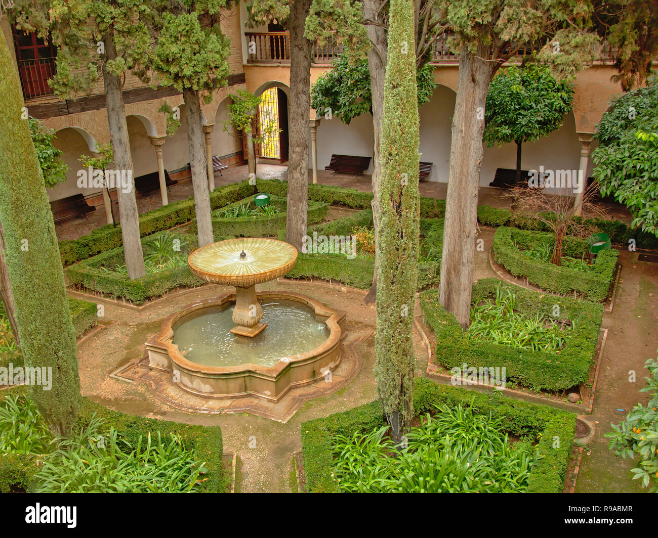 Green Patio With Fountain Hedges And Cypress Trees Inside Nasrid