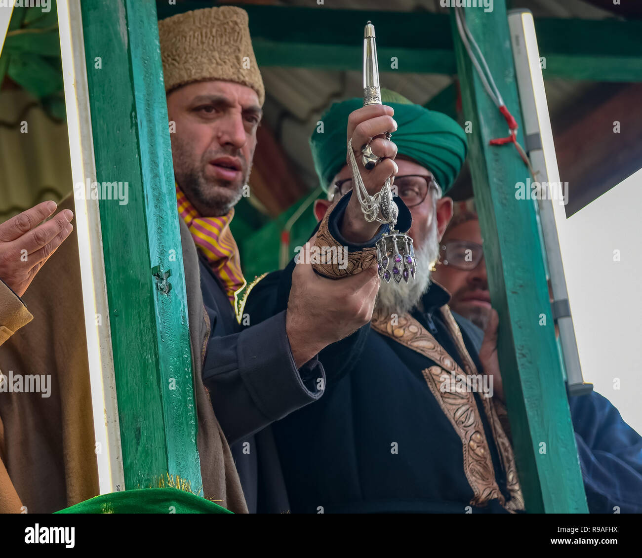 A Head Priest Seen Displaying A Relic Of The Prophet Muhammad.