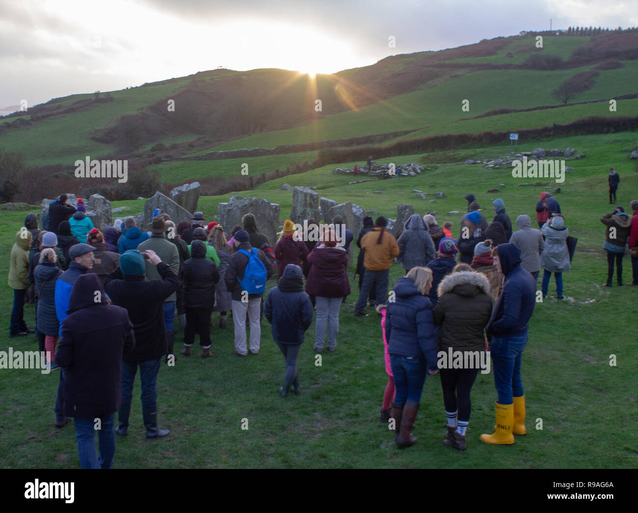 Drombeg Stone Circle, Glandore, West Cork, Ireland, December 21st 2018. Large crowds gathered at Drombeg Stone Circle this evening to celebrate the sunset on the Midwinter Solstice. Most experts believe this ancient stone circle was built to celebrate this shortest day of the year. Credit: aphperspective/Alamy Live News Stock Photo