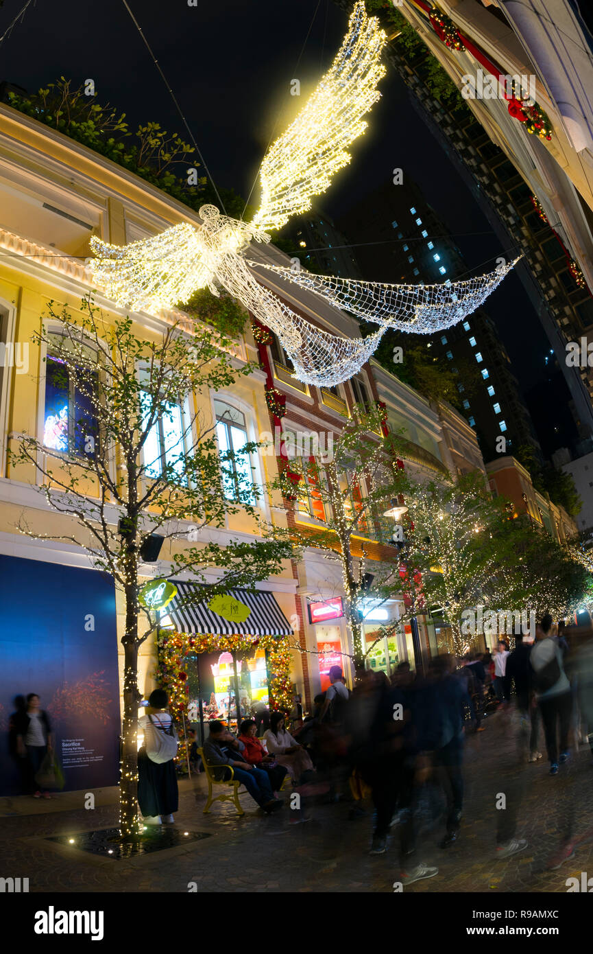 Hong Kong, China. 22nd December, 2018. Christmas and new year decorations  light up at the famous Lee Tung Avenue, the new urban renewal development  in Hong Kong, China. Credit: Bob Henry/Alamy Live