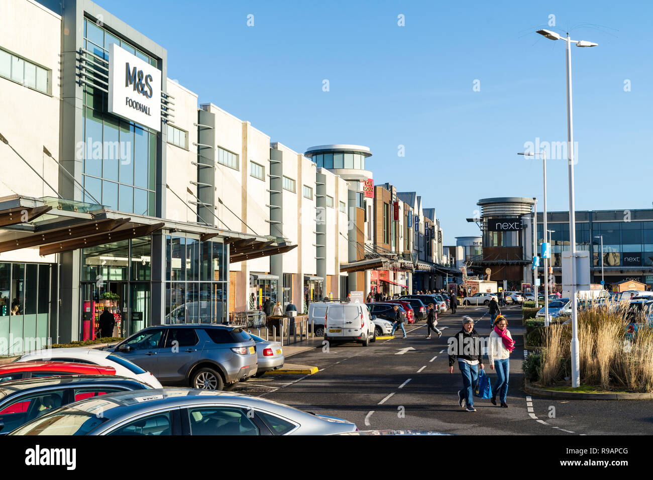 Westwood Cross shopping centre, England. Car park packed with cars, M&S