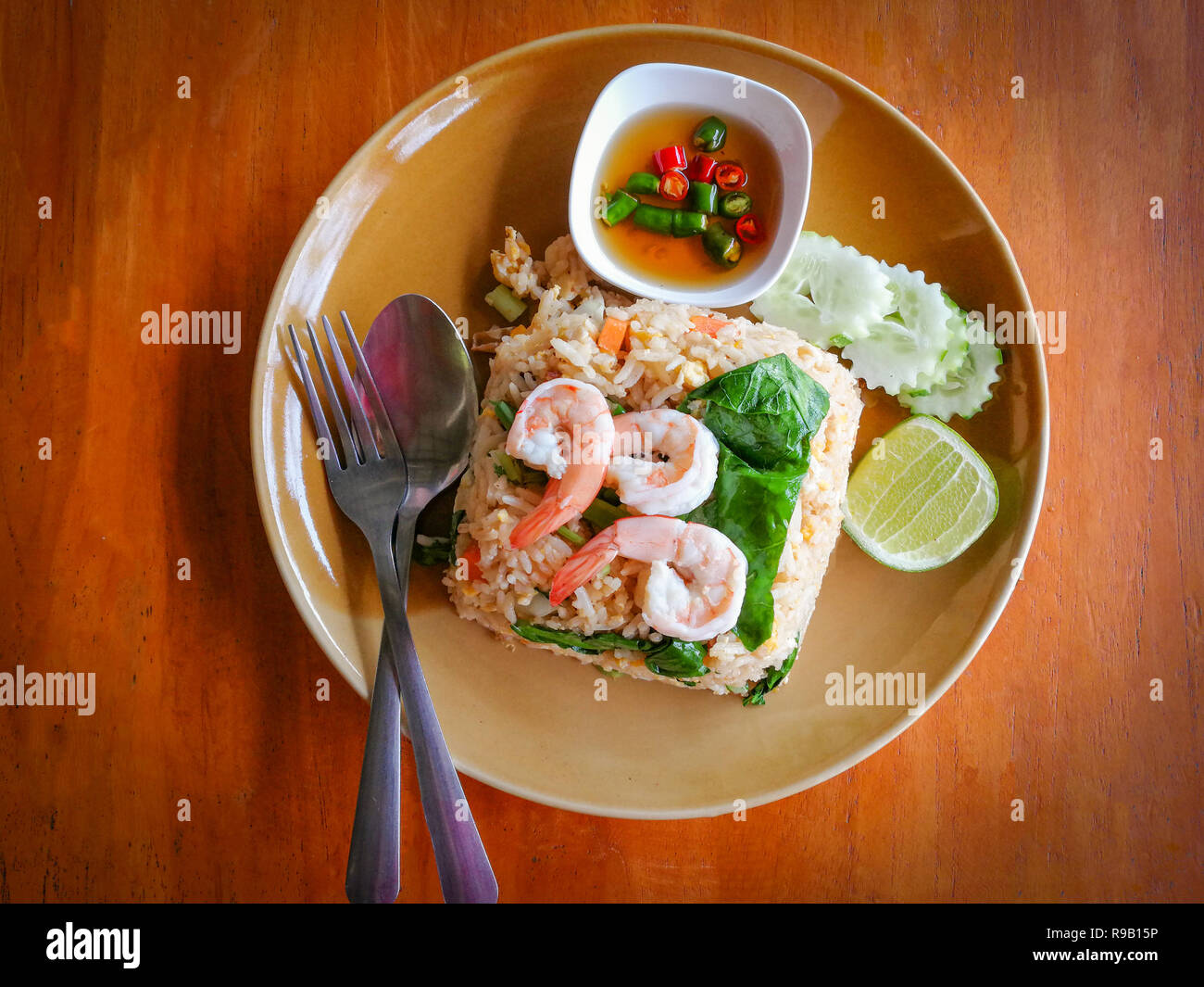 Fried rice chicken egg with shrimp on top / Rice fried shrimp egg and ...