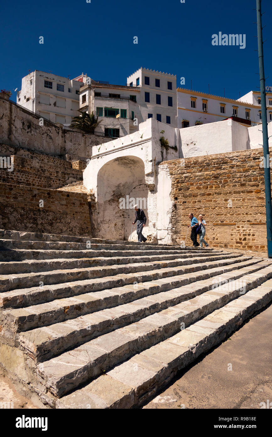 Morocco, Tangier, tourists  from cruise ship climbing steps to enter Medina at Bab el Marsa gate Stock Photo