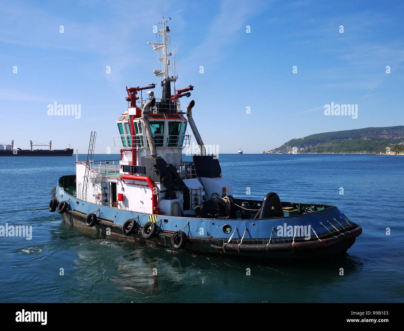 Tugboat Maneuvers Stock Photo