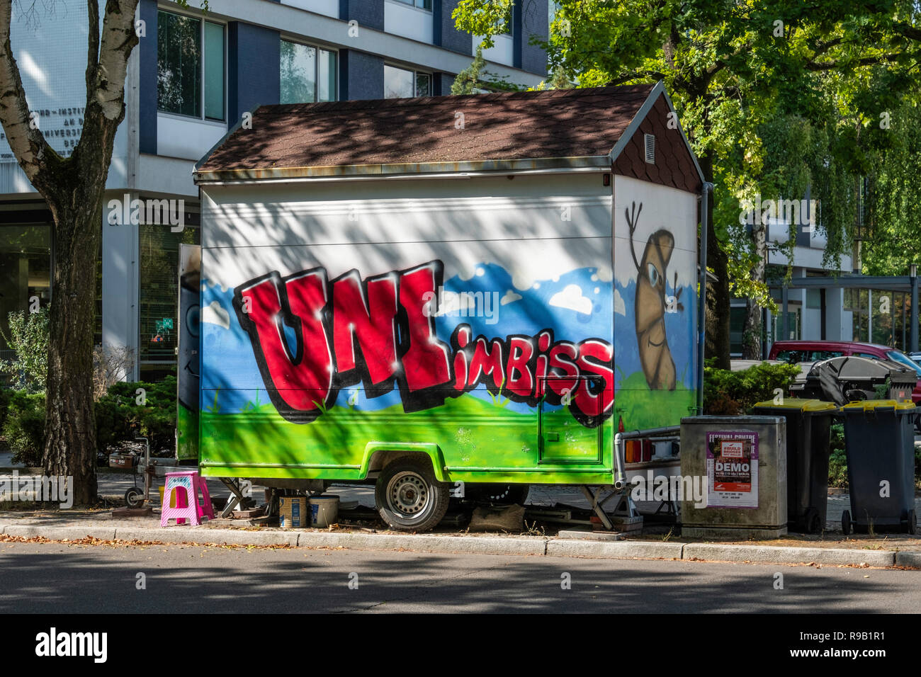 Berlin Dahlem, Uni Imbiss, snack stall on wheels selling snacks in a shady street Stock Photo