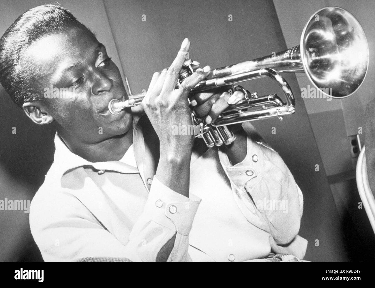 American jazz musician and composer Miles Davis playing the trumpet, 50s. Stock Photo