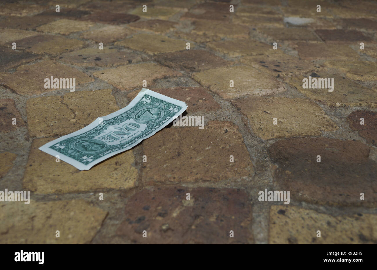 Finding Money On The Floor Stock Photo