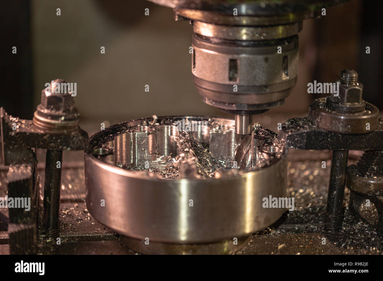 A special drill bit for steel drilling to mount new parts of the