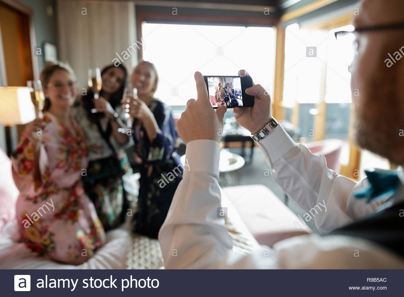 Room Service Hotel Staff With Camera Phone Photographing