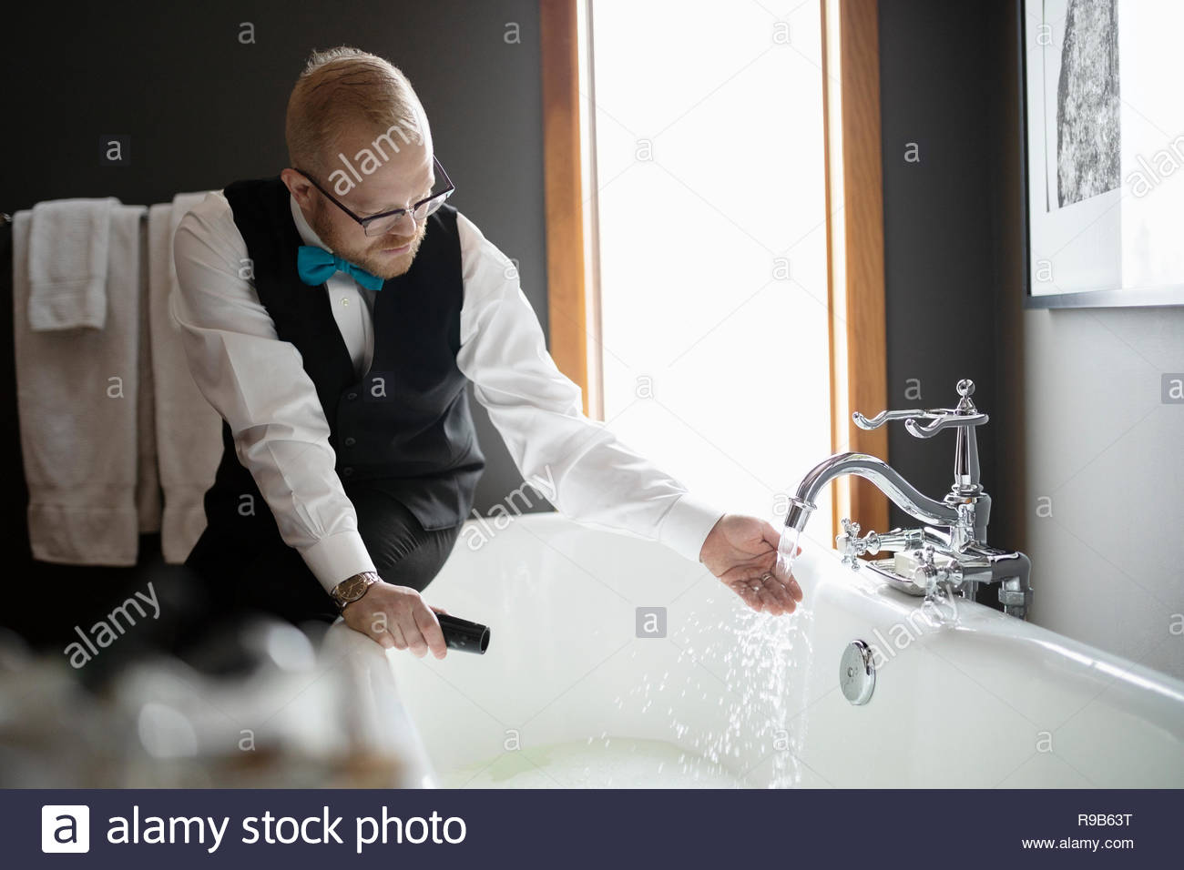 Hotel room service uniform hi-res stock photography and images - Alamy