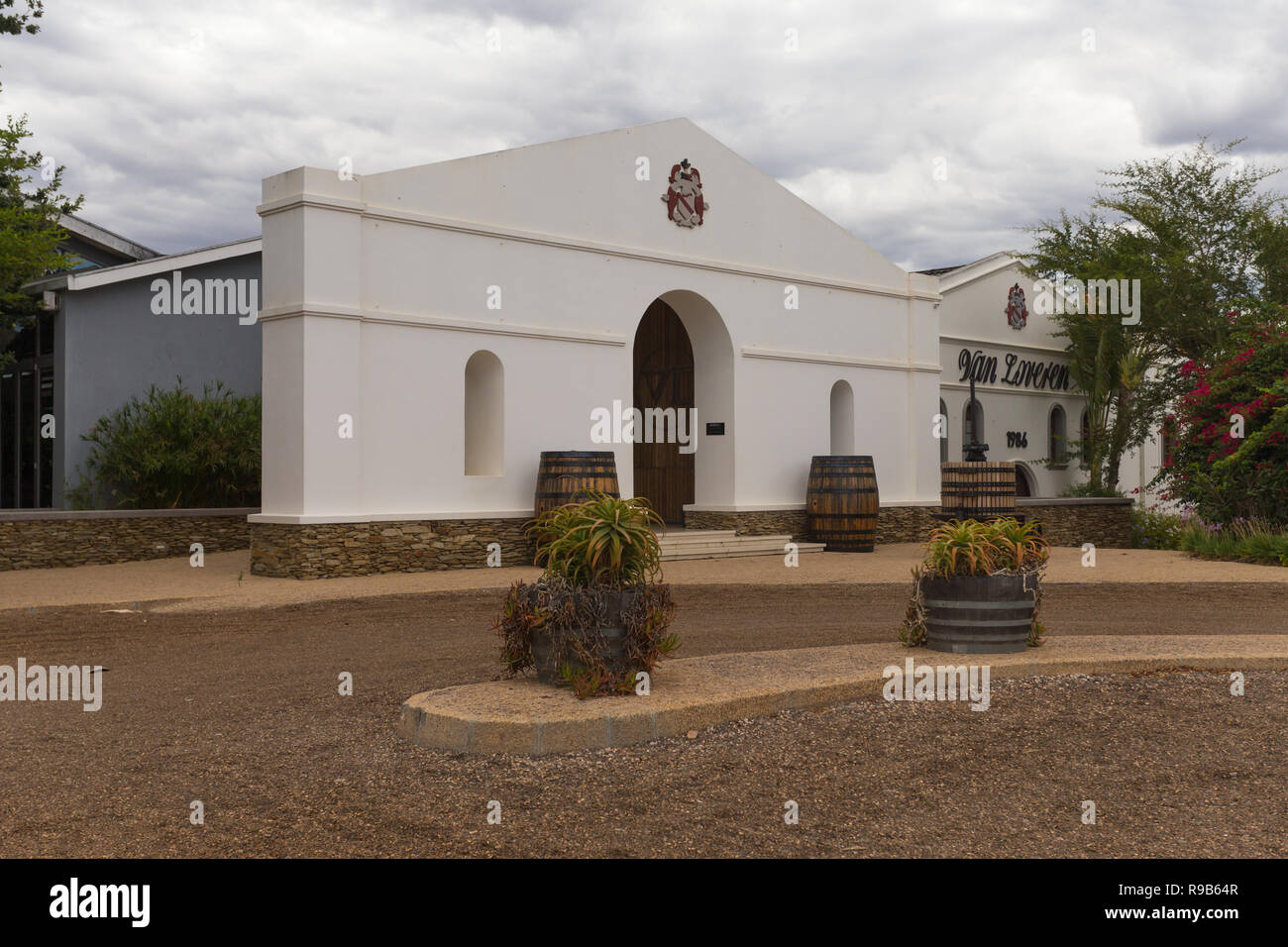 Van Loveren wine cellar building in Robertson against a cloudy sky