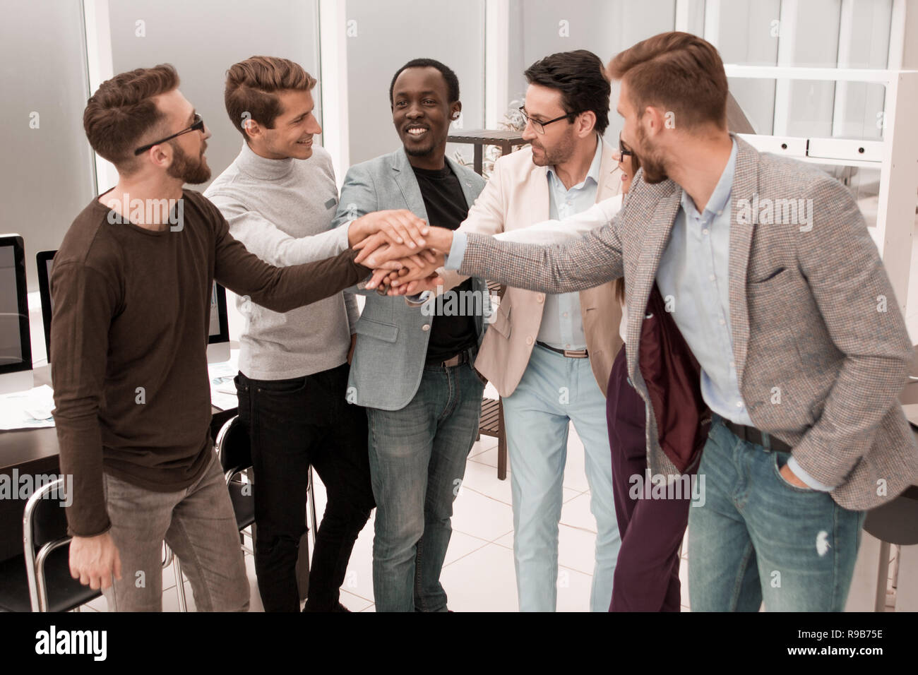 professional business team showing their unity Stock Photo - Alamy