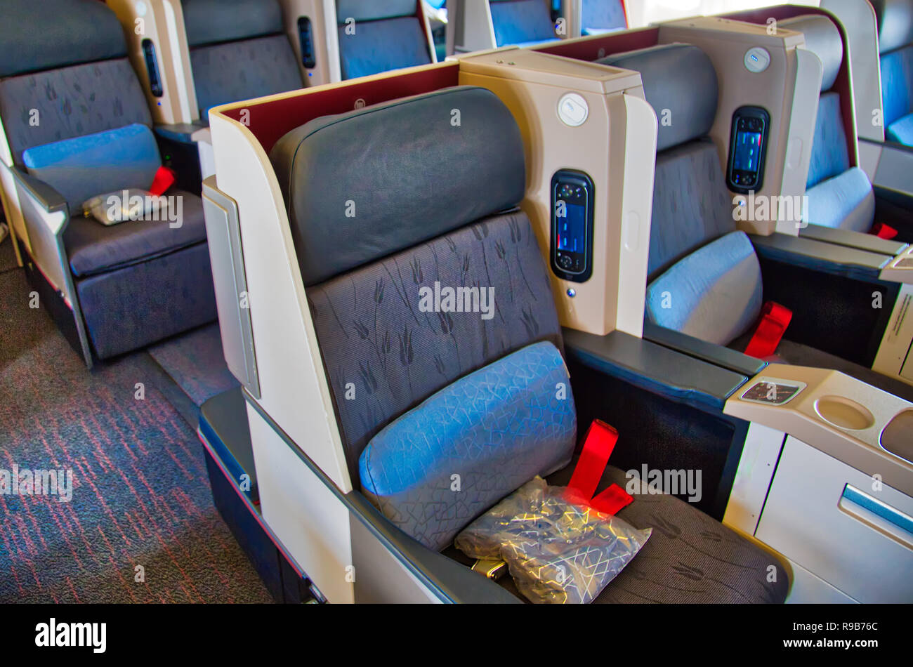 Modern airplane interiors, first class seats Stock Photo