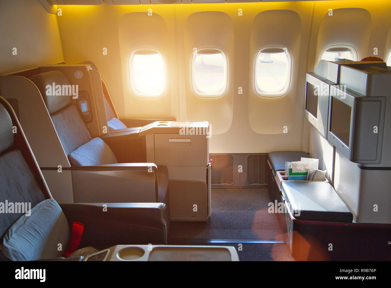 Modern airplane interiors, first class seats Stock Photo