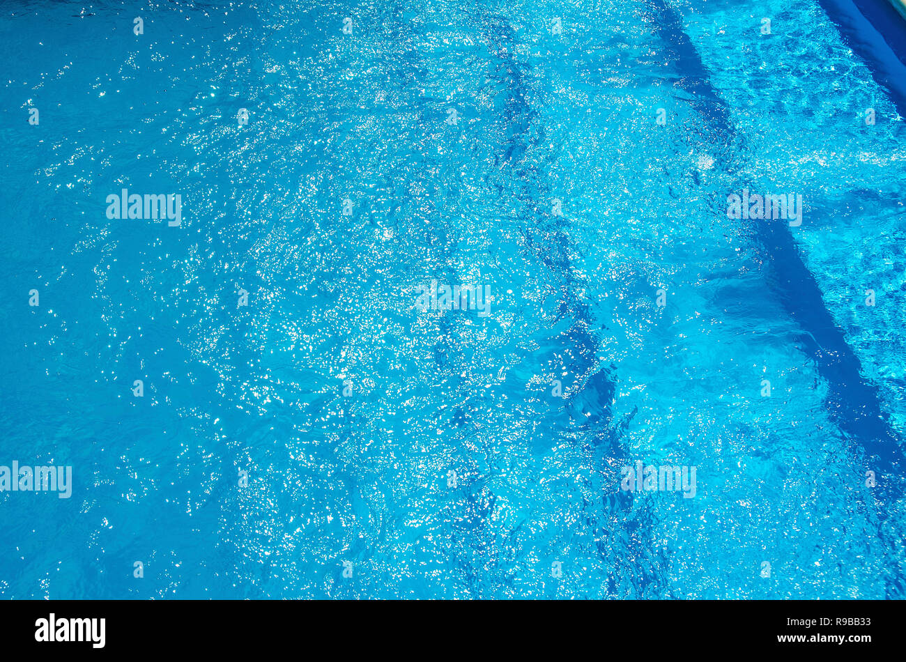 blue water background in swimming pool Stock Photo - Alamy
