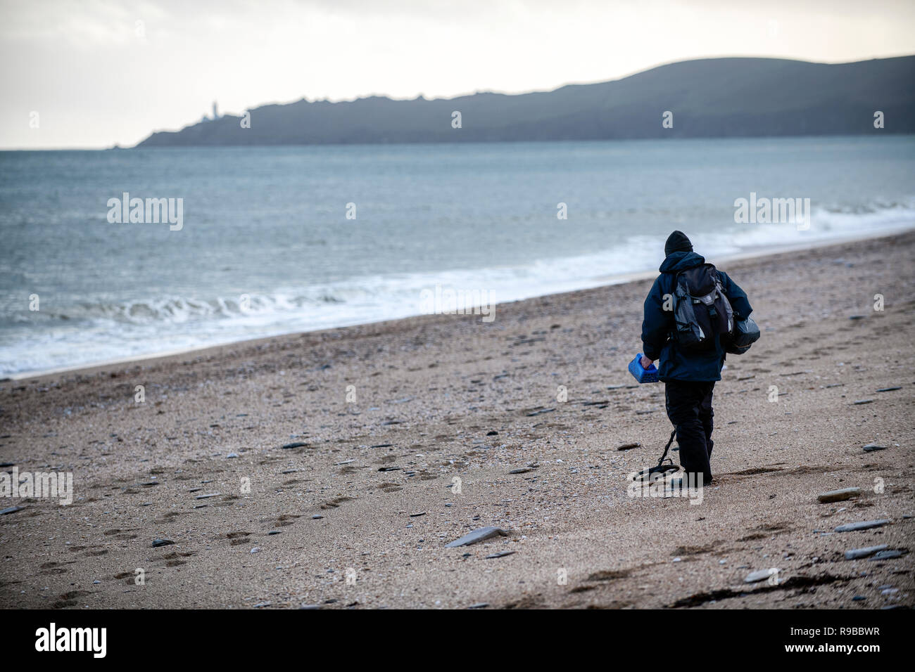 Metal detectorist on Slapton sands beach in Devon, United Kingdom Stock Photo Alamy